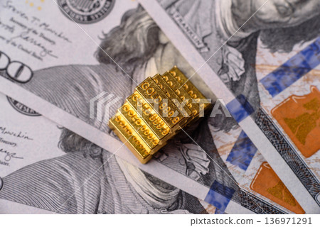 Gold bars or ingots as a tool for balance, financial investment, and savings. Gold bars or ingots Gold bars or ingots as a tool for balance, financial investment, and savings. Gold bars or ingots 136971291