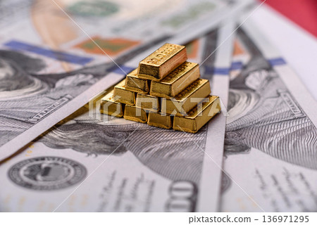 Gold bars or ingots as a tool for balance, financial investment, and savings. Gold bars or ingots 136971295