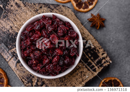 Dried sweet cranberries, natural berries for a healthy diet. Dried cranberries Dried sweet cranberries, natural berries for a healthy diet. Dried cranberries 136971318