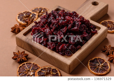 Dried sweet cranberries, natural berries for a healthy diet. Dried cranberries Dried sweet cranberries, natural berries for a healthy diet. Dried cranberries 136971329