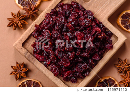 Dried sweet cranberries, natural berries for a healthy diet. Dried cranberries Dried sweet cranberries, natural berries for a healthy diet. Dried cranberries 136971330