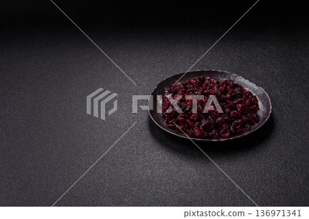 Dried sweet cranberries, natural berries for a healthy diet. Dried cranberries Dried sweet cranberries, natural berries for a healthy diet. Dried cranberries 136971341