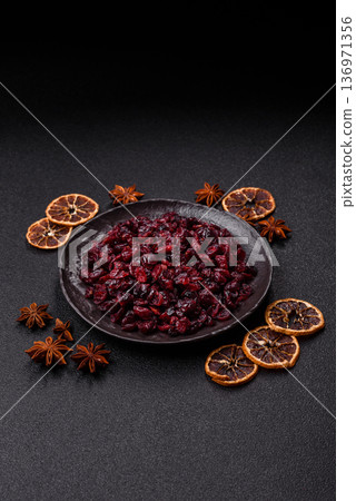 Dried sweet cranberries, natural berries for a healthy diet. Dried cranberries Dried sweet cranberries, natural berries for a healthy diet. Dried cranberries 136971356