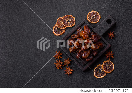 Dried sweet dates, natural tropical fruits for a healthy diet. Dried dates 136971375