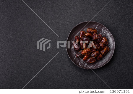 Dried sweet dates, natural tropical fruits for a healthy diet. Dried dates 136971391