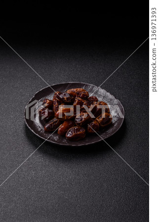 Dried sweet dates, natural tropical fruits for a healthy diet. Dried dates 136971393