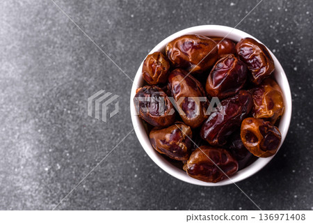 Dried sweet dates, natural tropical fruits for a healthy diet. Dried dates 136971408