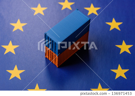 Cargo containers on the EU flag as a conceptual backdrop. Cargo containers on the EU flag 136971453