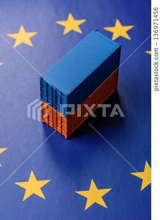 Cargo containers on the EU flag as a conceptual backdrop. Cargo containers on the EU flag 136971456