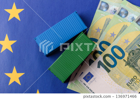 Cargo containers on the EU flag as a conceptual backdrop. Cargo containers on the EU flag 136971466