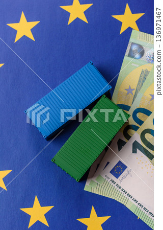 Cargo containers on the EU flag as a conceptual backdrop. Cargo containers on the EU flag 136971467
