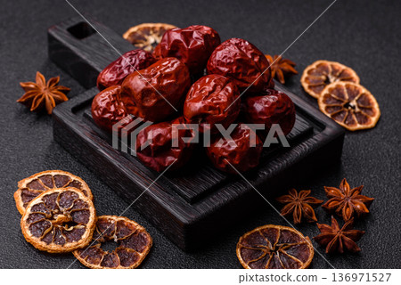 Red dried dates, the Chinese sweet fruit jujube, as a healthy food. Red dates, jujube Red dried dates, the Chinese sweet fruit jujube, as a healthy food. Red dates, jujube 136971527