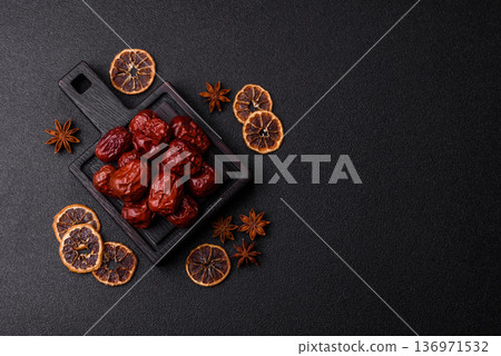 Red dried dates, the Chinese sweet fruit jujube, as a healthy food. Red dates, jujube Red dried dates, the Chinese sweet fruit jujube, as a healthy food. Red dates, jujube 136971532