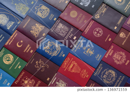 Passports of citizens of different countries of the world. Passports background Passports of citizens of different countries of the world. Passports background 136971559