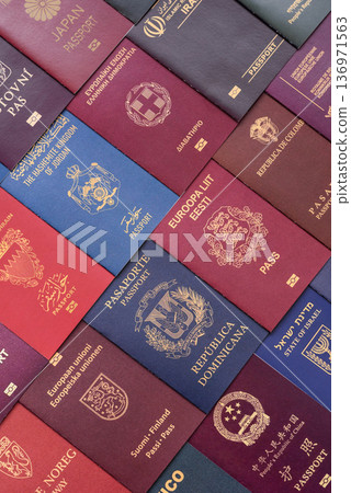 Passports of citizens of different countries of the world. Passports background 136971563