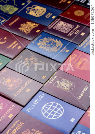 Passports of citizens of different countries of the world. Passports background Passports of citizens of different countries of the world. Passports background 136971564