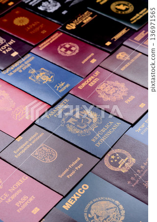 Passports of citizens of different countries of the world. Passports background Passports of citizens of different countries of the world. Passports background 136971565