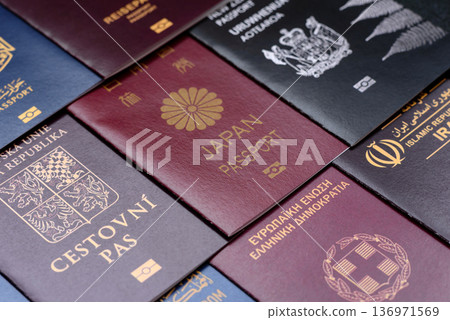 Passports of citizens of different countries of the world. Passports background 136971569