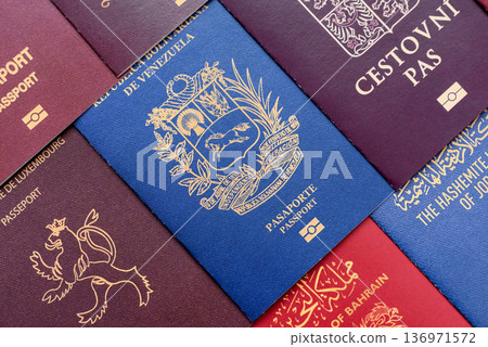 Passports of citizens of different countries of the world. Passports background 136971572