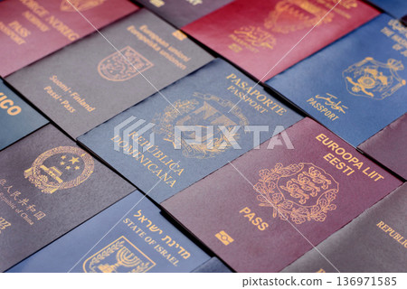 Passports of citizens of different countries of the world. Passports background 136971585
