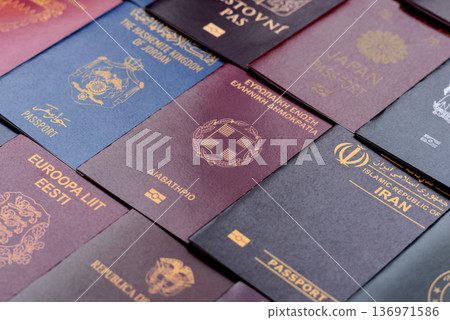 Passports of citizens of different countries of the world. Passports background Passports of citizens of different countries of the world. Passports background 136971586