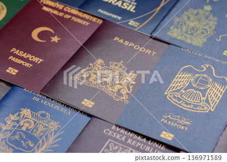 Passports of citizens of different countries of the world. Passports background 136971589