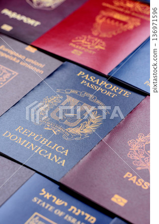 Passports of citizens of different countries of the world. Passports background Passports of citizens of different countries of the world. Passports background 136971596