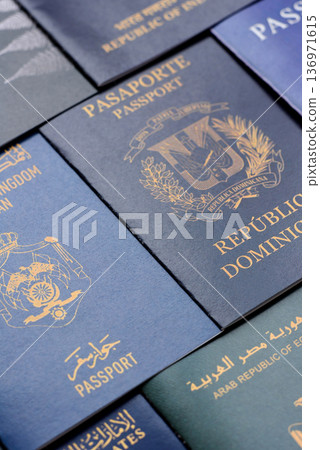 Passports of citizens of different countries of the world. Passports background Passports of citizens of different countries of the world. Passports background 136971615