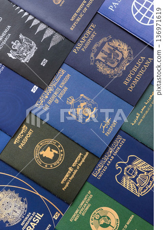Passports of citizens of different countries of the world. Passports background 136971619