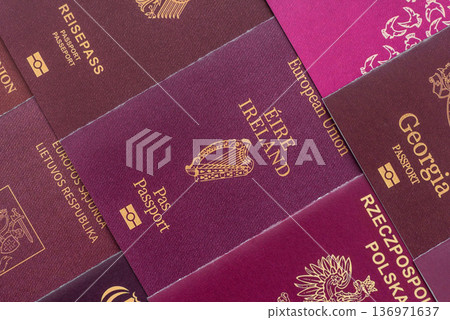 Passports of citizens of different countries of the world. Passports background Passports of citizens of different countries of the world. Passports background 136971637