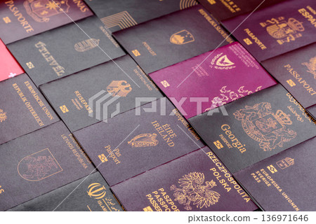 Passports of citizens of different countries of the world. Passports background 136971646