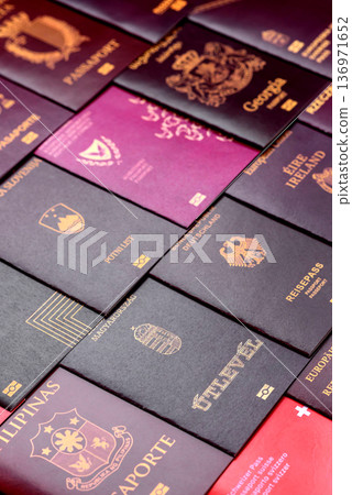 Passports of citizens of different countries of the world. Passports background 136971652