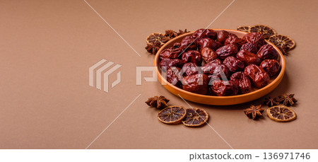 Red dried dates, the Chinese sweet fruit jujube, as a healthy food. Red dates, jujube Red dried dates, the Chinese sweet fruit jujube, as a healthy food. Red dates, jujube 136971746
