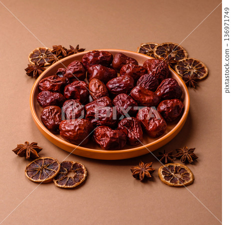 Red dried dates, the Chinese sweet fruit jujube, as a healthy food. Red dates, jujube Red dried dates, the Chinese sweet fruit jujube, as a healthy food. Red dates, jujube 136971749