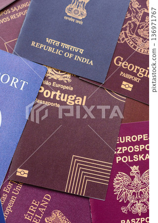 Passports of citizens of different countries of the world. Passports background Passports of citizens of different countries of the world. Passports background 136971767