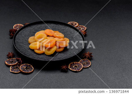 Dried apricots are a sweet, healthy fruit for vegans and vegetarians. Dried apricot Dried apricots are a sweet, healthy fruit for vegans and vegetarians. Dried apricot 136971844