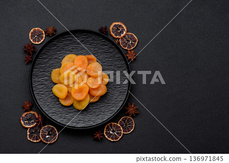 Dried apricots are a sweet, healthy fruit for vegans and vegetarians. Dried apricot 136971845
