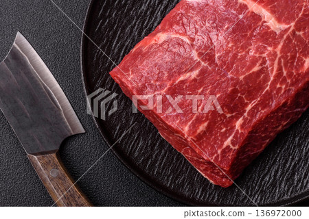 A piece of raw beef, a tenderloin for grilling or barbecue. Raw beef 136972000