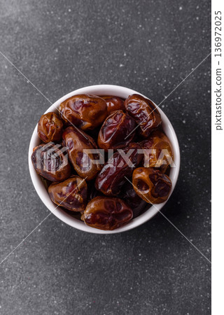 Dried sweet dates, natural tropical fruits for a healthy diet. Dried dates 136972025