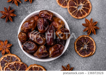 Dried sweet dates, natural tropical fruits for a healthy diet. Dried dates 136972028