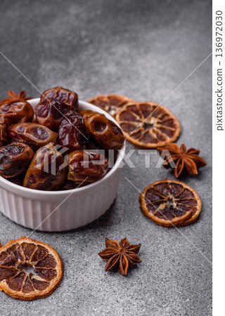 Dried sweet dates, natural tropical fruits for a healthy diet. Dried dates 136972030