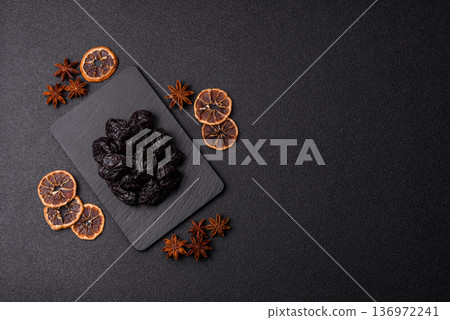 Sweet dried plums or prunes, organic dehydrated fruit for dietary nutrition. Prunes or dried plums Sweet dried plums or prunes, organic dehydrated fruit for dietary nutrition. Prunes or dried plums 136972241