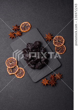 Sweet dried plums or prunes, organic dehydrated fruit for dietary nutrition. Prunes or dried plums Sweet dried plums or prunes, organic dehydrated fruit for dietary nutrition. Prunes or dried plums 136972243