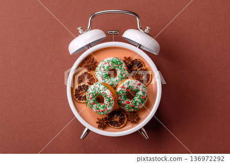 Vintage alarm clock on brown surface as a conceptual background for deadlines for tasks Vintage alarm clock on brown surface as a conceptual background for deadlines for tasks 136972292