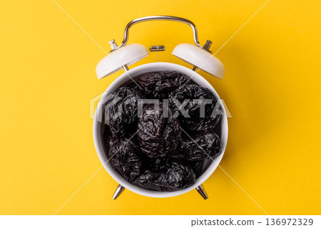 Sweet dried plums or prunes, organic dehydrated fruit for dietary nutrition. Prunes or dried plums Sweet dried plums or prunes, organic dehydrated fruit for dietary nutrition. Prunes or dried plums 136972329