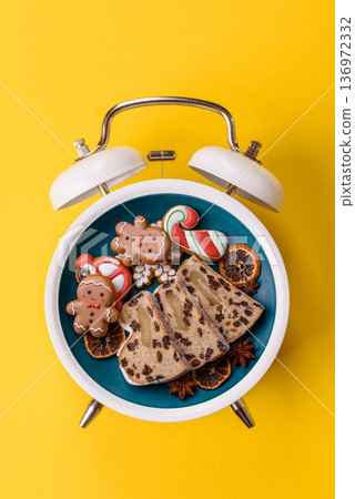 Stollen, a German Christmas pastry for the winter holidays. Stollen as a food background 136972332