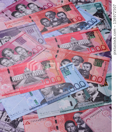 Dominican republic money, peso currency, banknotes of various denominations. Dominican money, peso Dominican republic money, peso currency, banknotes of various denominations. Dominican money, peso 136972507