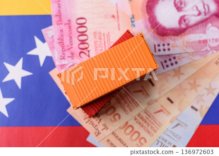 Cargo containers on the Venezuela flag, conceptual backdrop for goods logistics. Cargo containers Cargo containers on the Venezuela flag, conceptual backdrop for goods logistics. Cargo containers 136972603