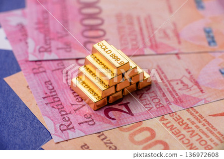 Gold bars or ingots as a tool for balance, financial investment, and savings. Gold bars 136972608