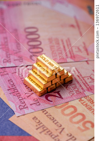 Gold bars or ingots as a tool for balance, financial investment, and savings. Gold bars 136972611